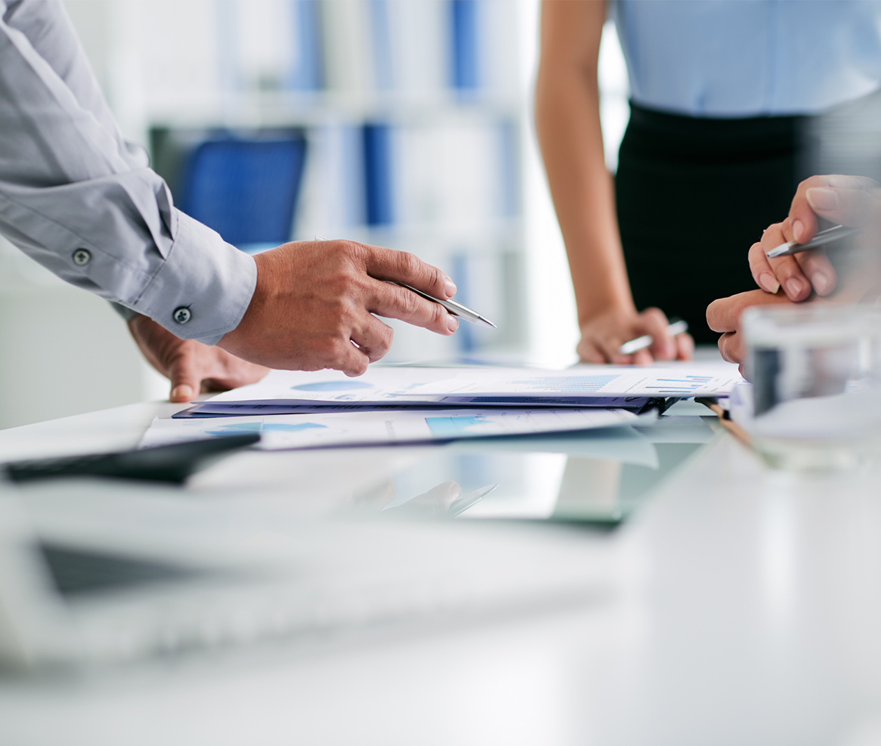 People reviewing charts in meeting