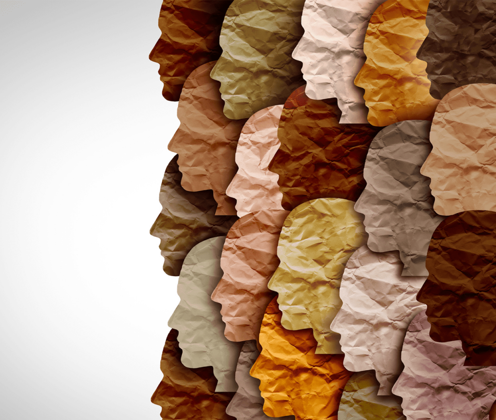 Abstract heads of various colors standing together highlighting diversityf