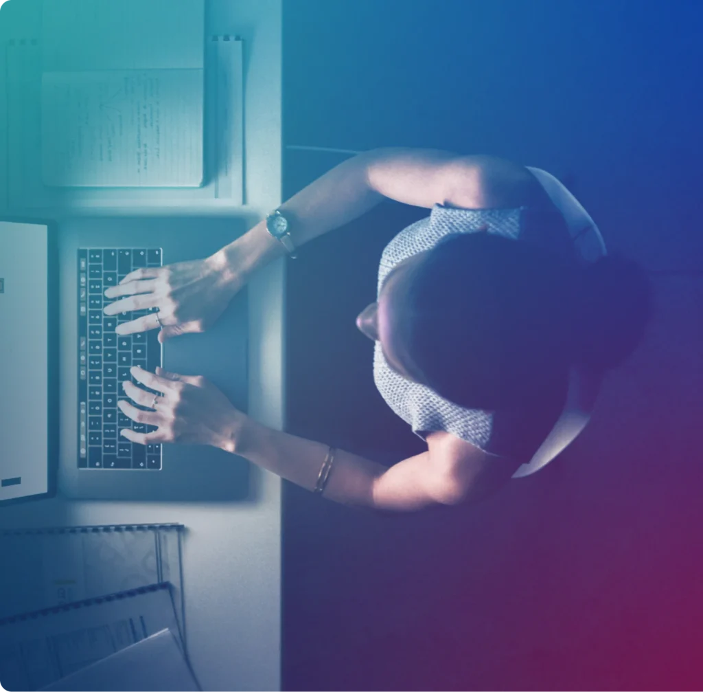 Woman typing on laptop